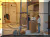 Fr. Van Vliet and helpers, installing the Altar and rail